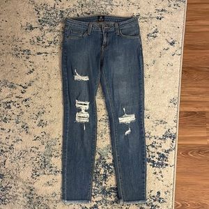 Light blue skinny jeans with tags!